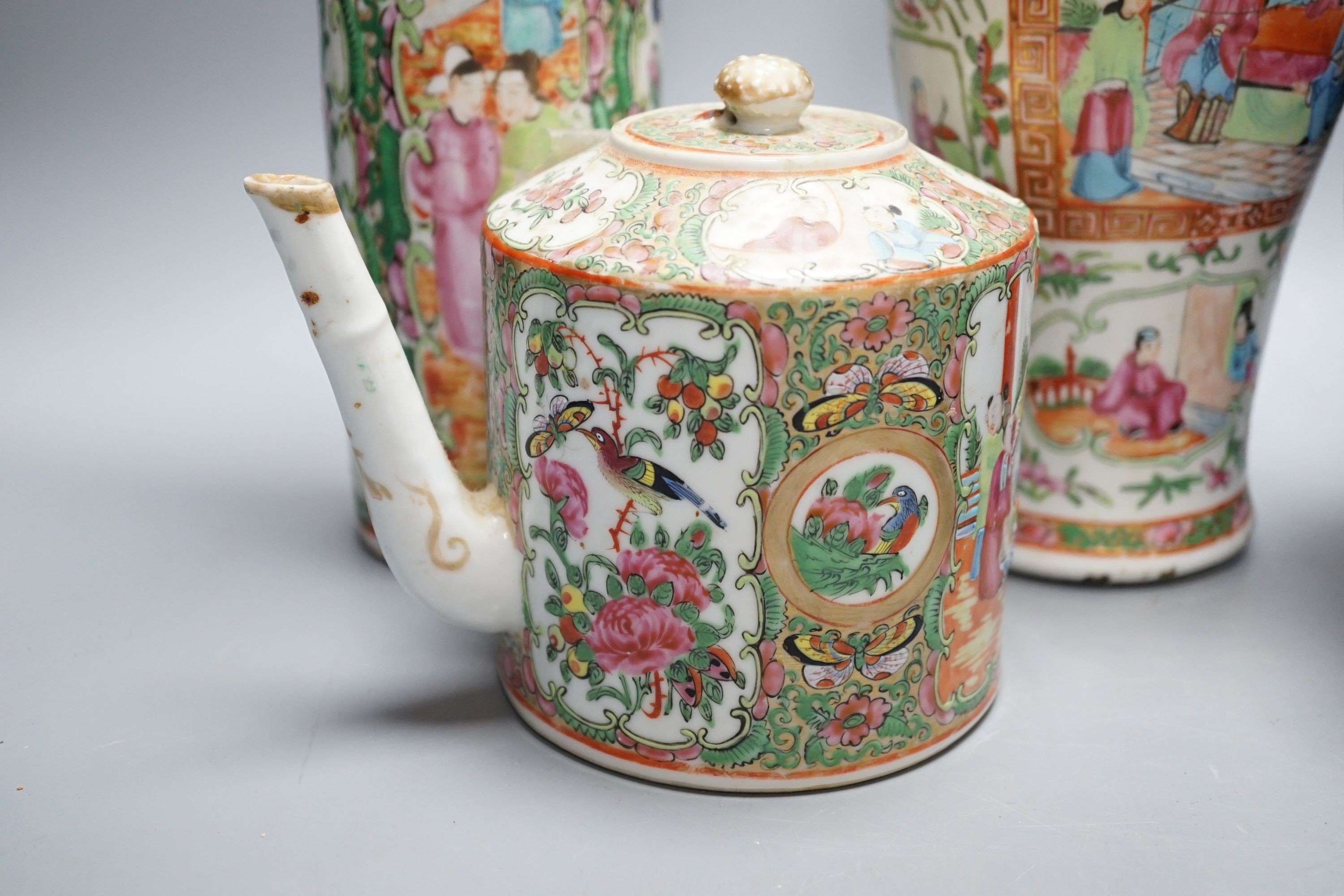 Two Chinese famille rose vases, two Chinese famille rose teapots and a blue ground enamelled jar tallest 26.5cm